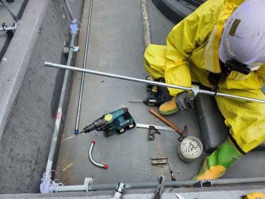 Removal of damaged film-type leak detector and new piping work on site