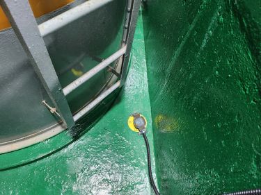 YHSP-SAR leak detector installed inside the containment curb below a newly installed sulfuric acid tank