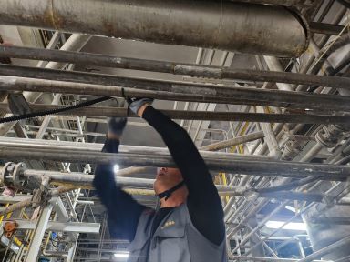 Piping and wiring work for leak detector sensor installation