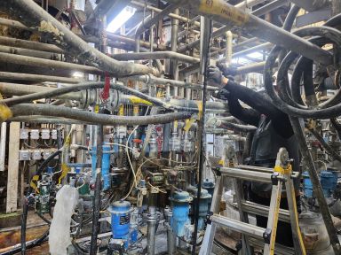 Piping work for leak detector installation above the wet-strength resin production line