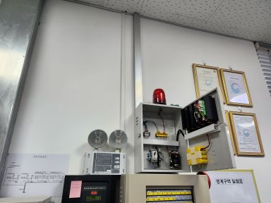 Interior of the office leak detector receiver panel with backup battery