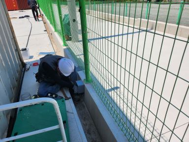 Sensor wiring work around an outdoor organic solvent tank